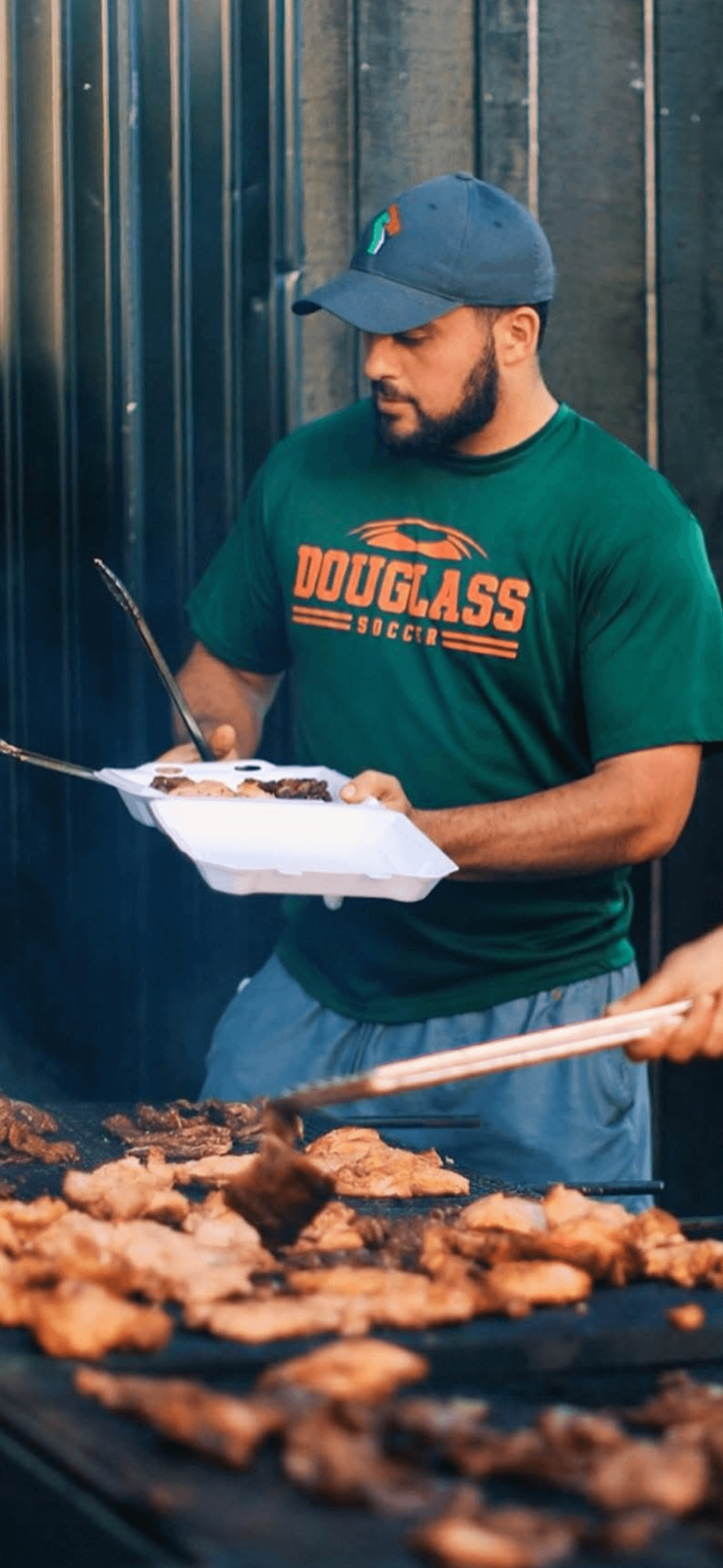 Coach Shalash preparing food